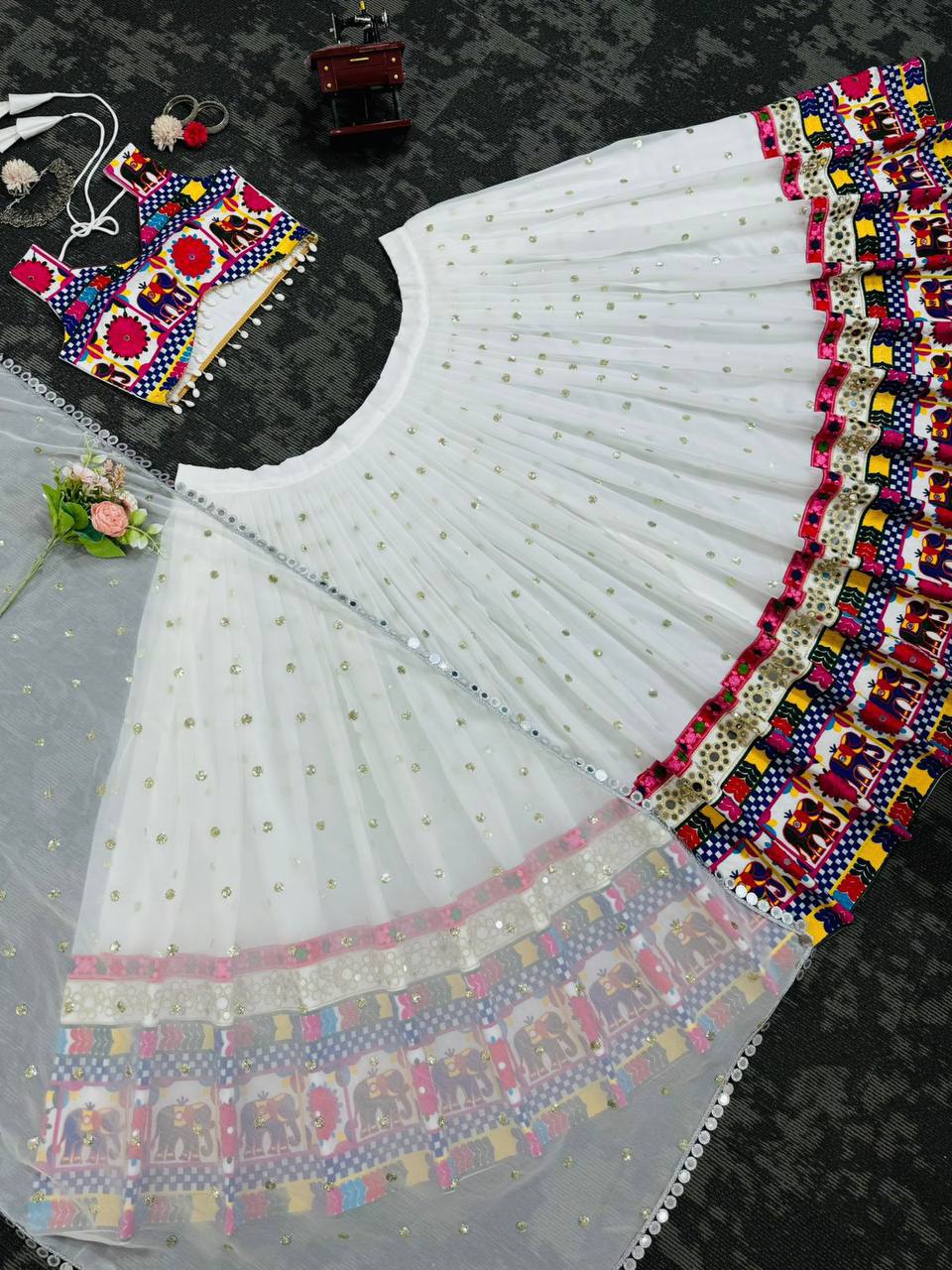 Exquisite Pristine White Designer Lehenga Choli with Vibrant Multicolored Traditional Elephant Embroidery and Mirror Work Detailing